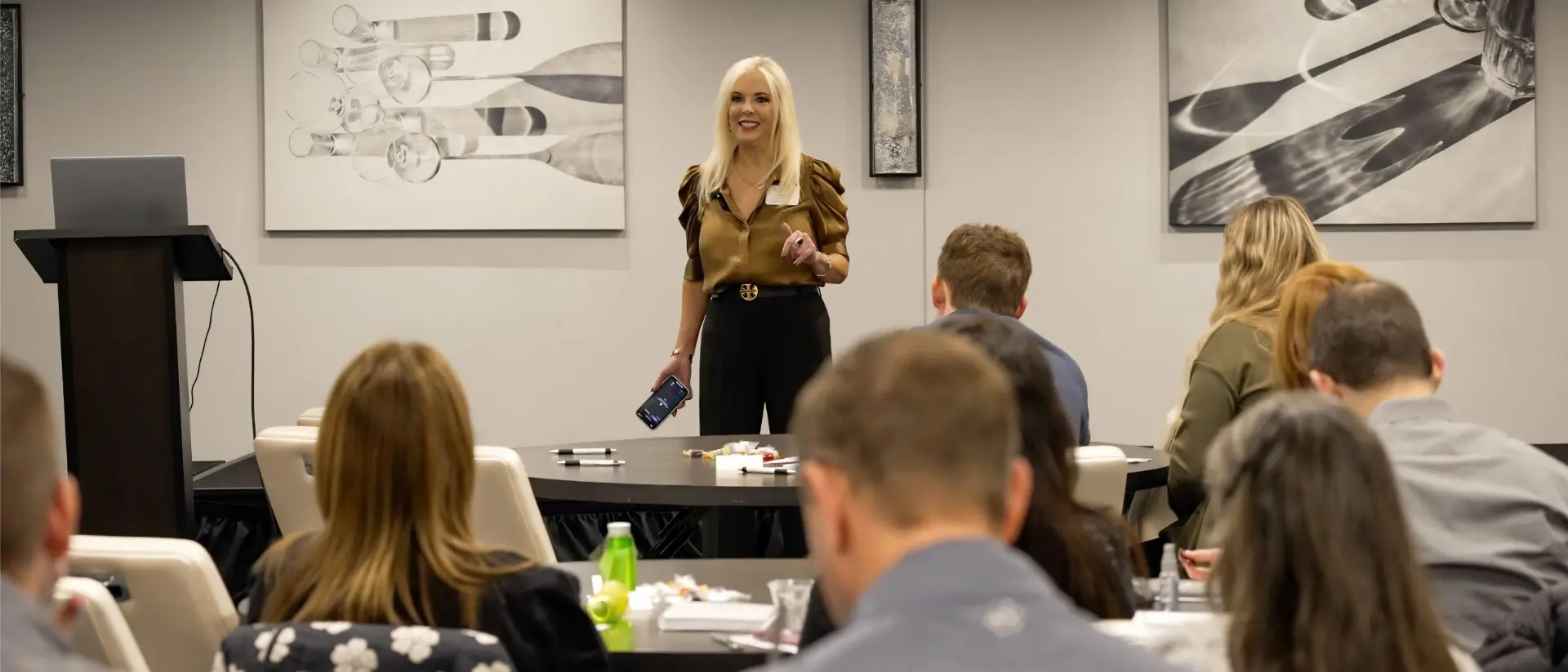 Stefani Seek speaking to a full room